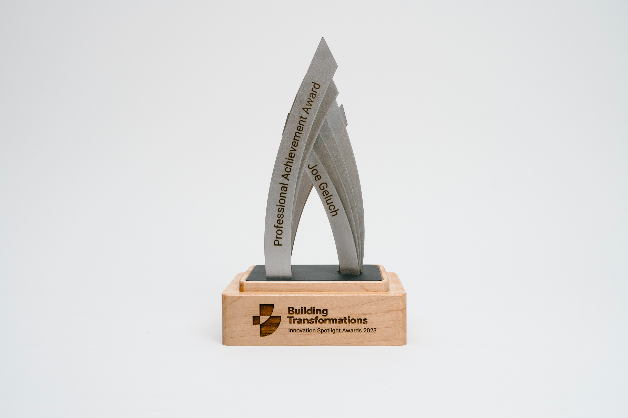 Modern trophy recognizes Joe Geluch for a Professional Achievement Award